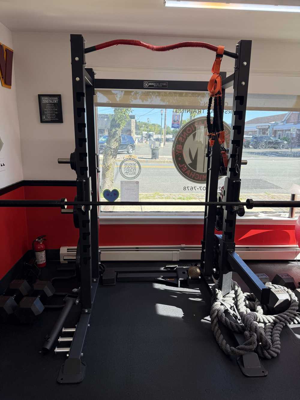 Power rack by the storefront window inside the private Transformations by Sean Michael training studio in Midland Park, NJ
