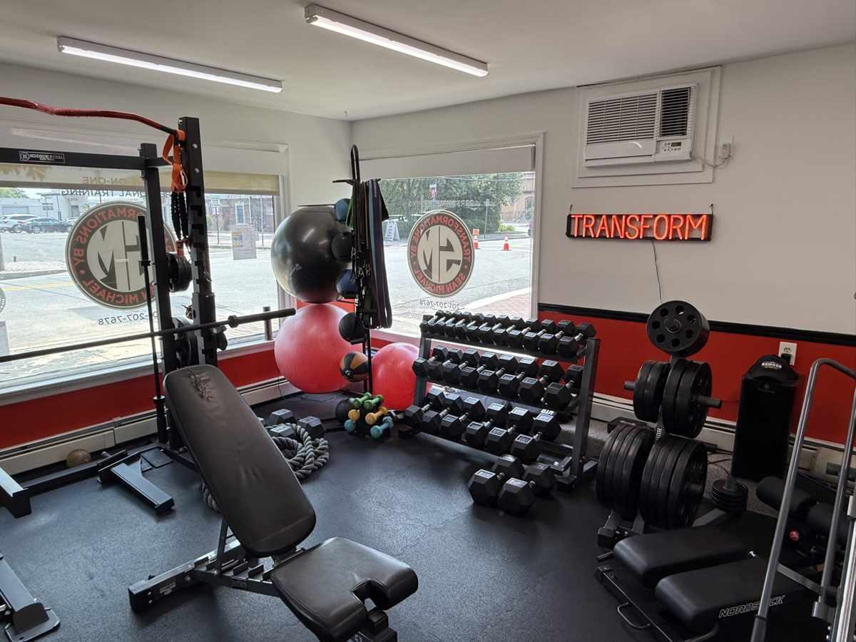 Dumbbell rack and training equipment inside the private personal training studio in Midland Park, NJ